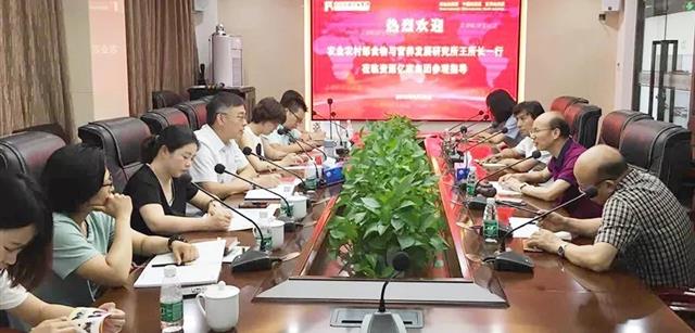 农业农村部食物与营养发展研究所王晓红副所长率猪课题小组到访资源集团调研生态猪肉产业